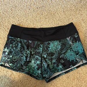 Beautiful teal and black printed Lululemon athletic shorts